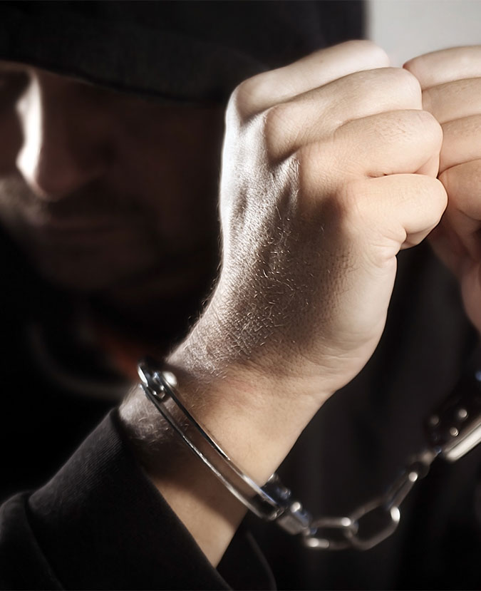 handcuffed criminal
